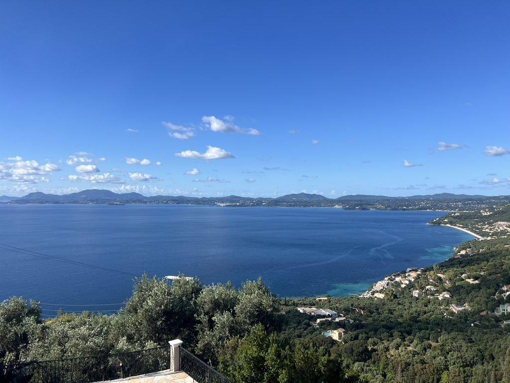 Panoramic view over the coastline towards Corfu Town