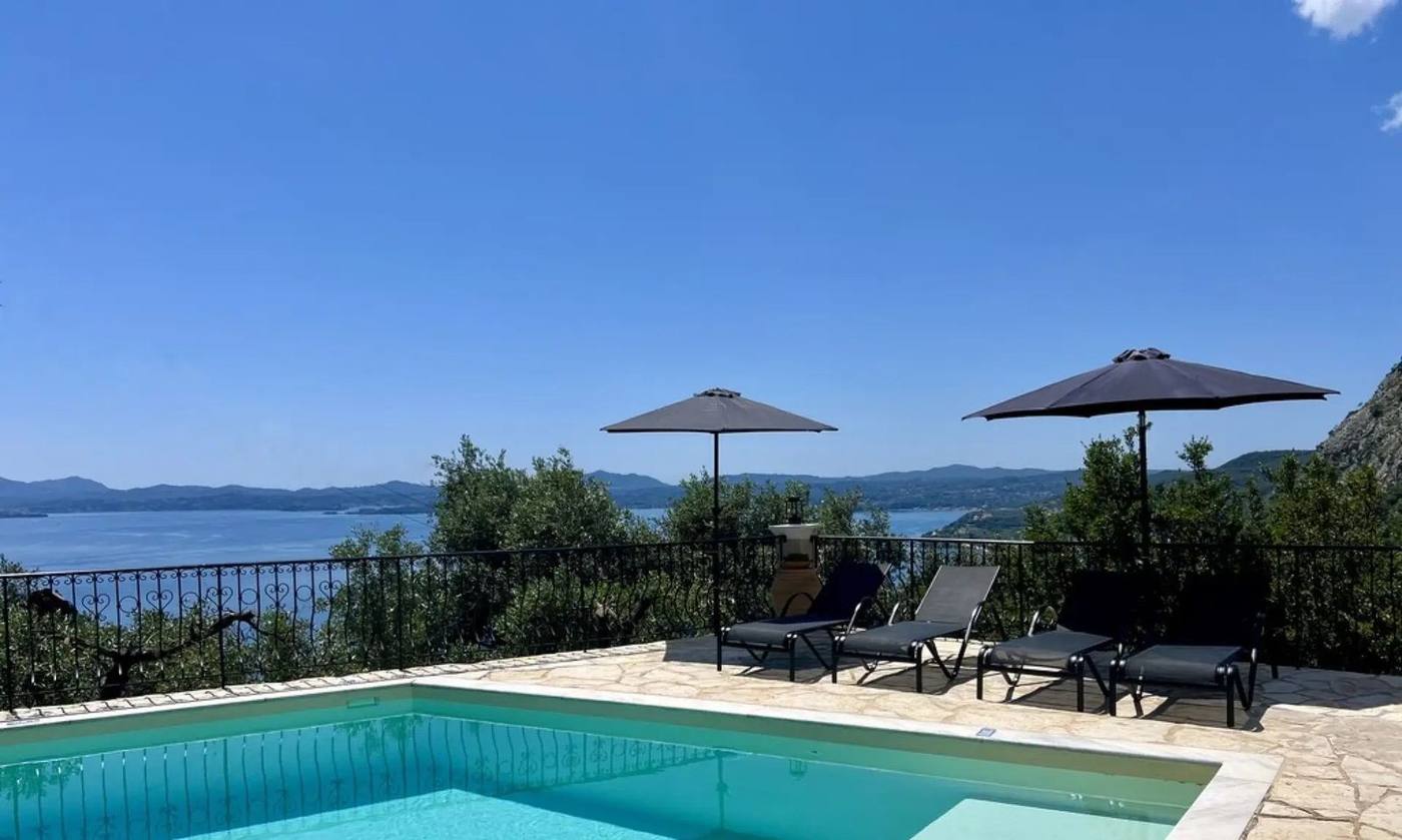 Sun loungers and umbrellas along the pool
